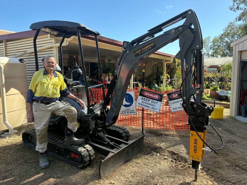 Jeff with his new JHM20 mini excavator and hydraulic breaker at his property