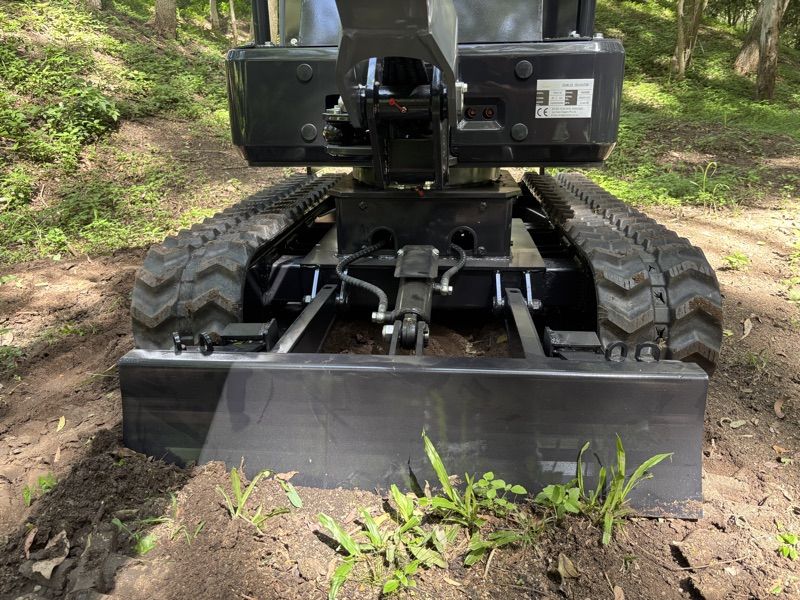 Jay-Hawk JHM14 deep in Aussie bush, ROPS canopy framed by gum trees