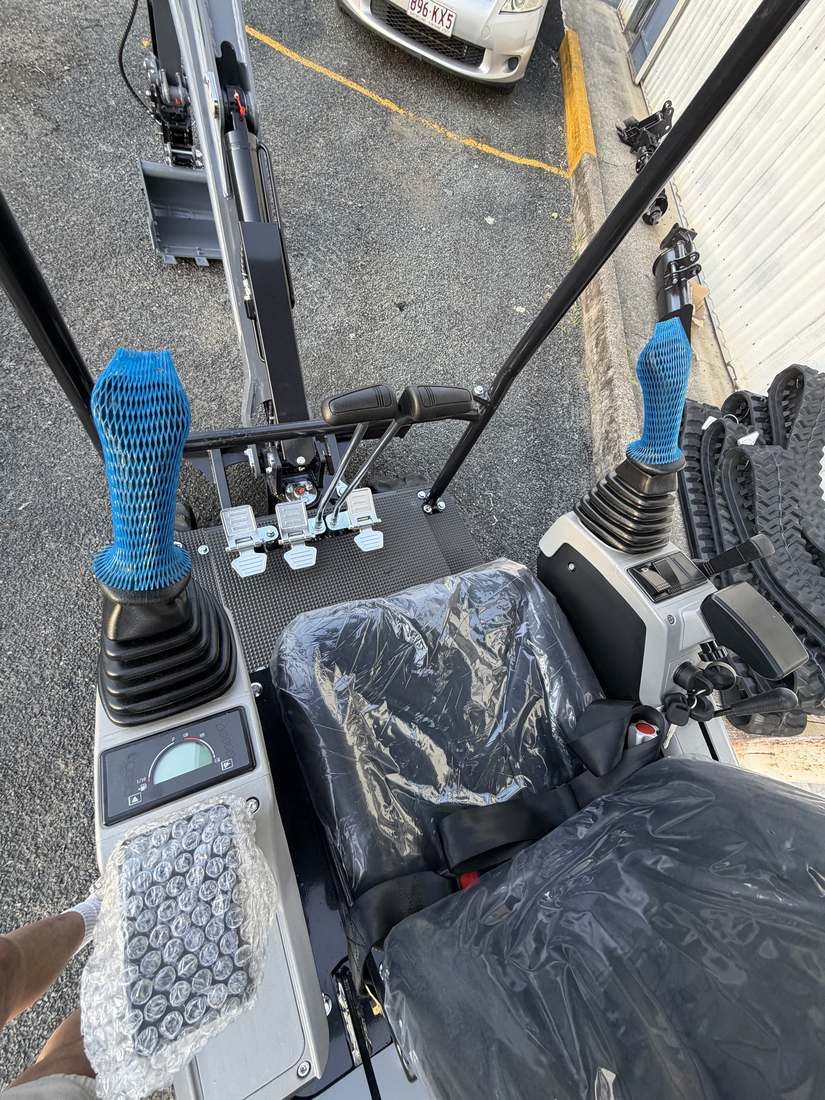 JHM14 mini excavator operator seat and joystick controls