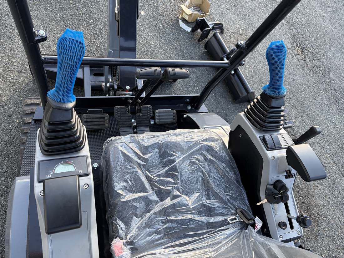 JHM20 mini excavator cab controls and joysticks