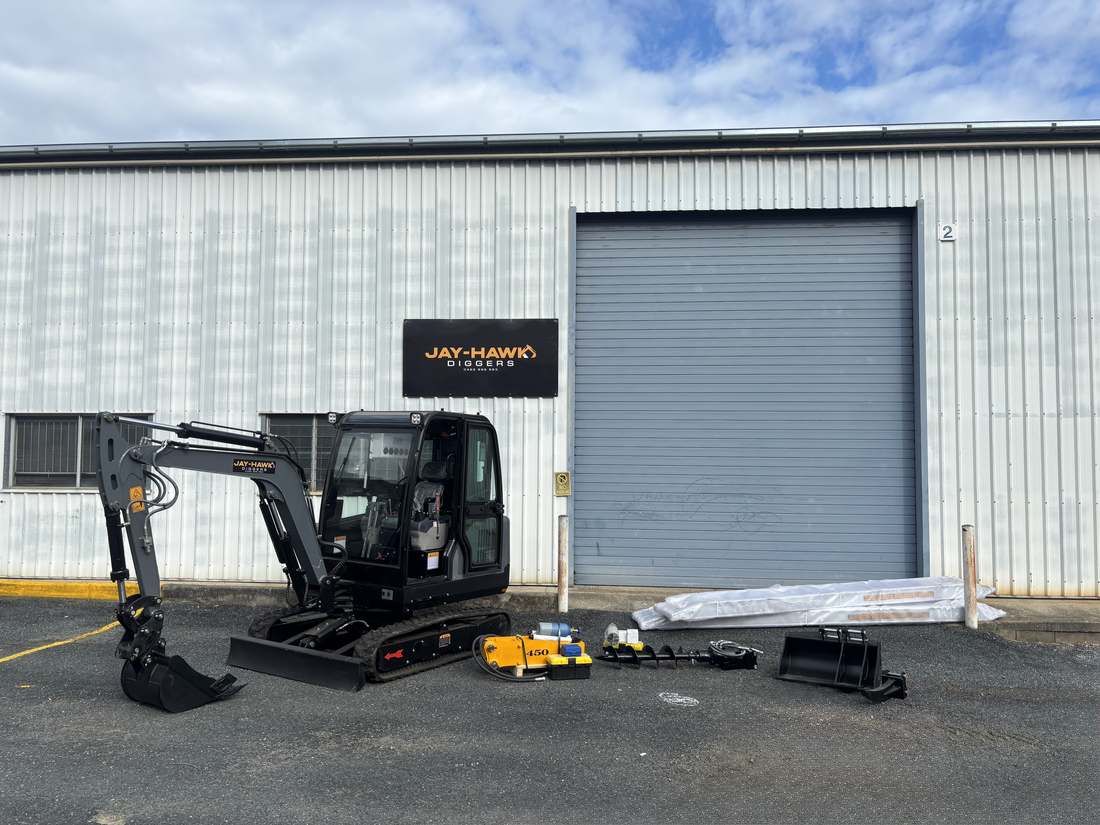 JHM30 mini excavator with enclosed cab at the Jay-Hawk Diggers yard